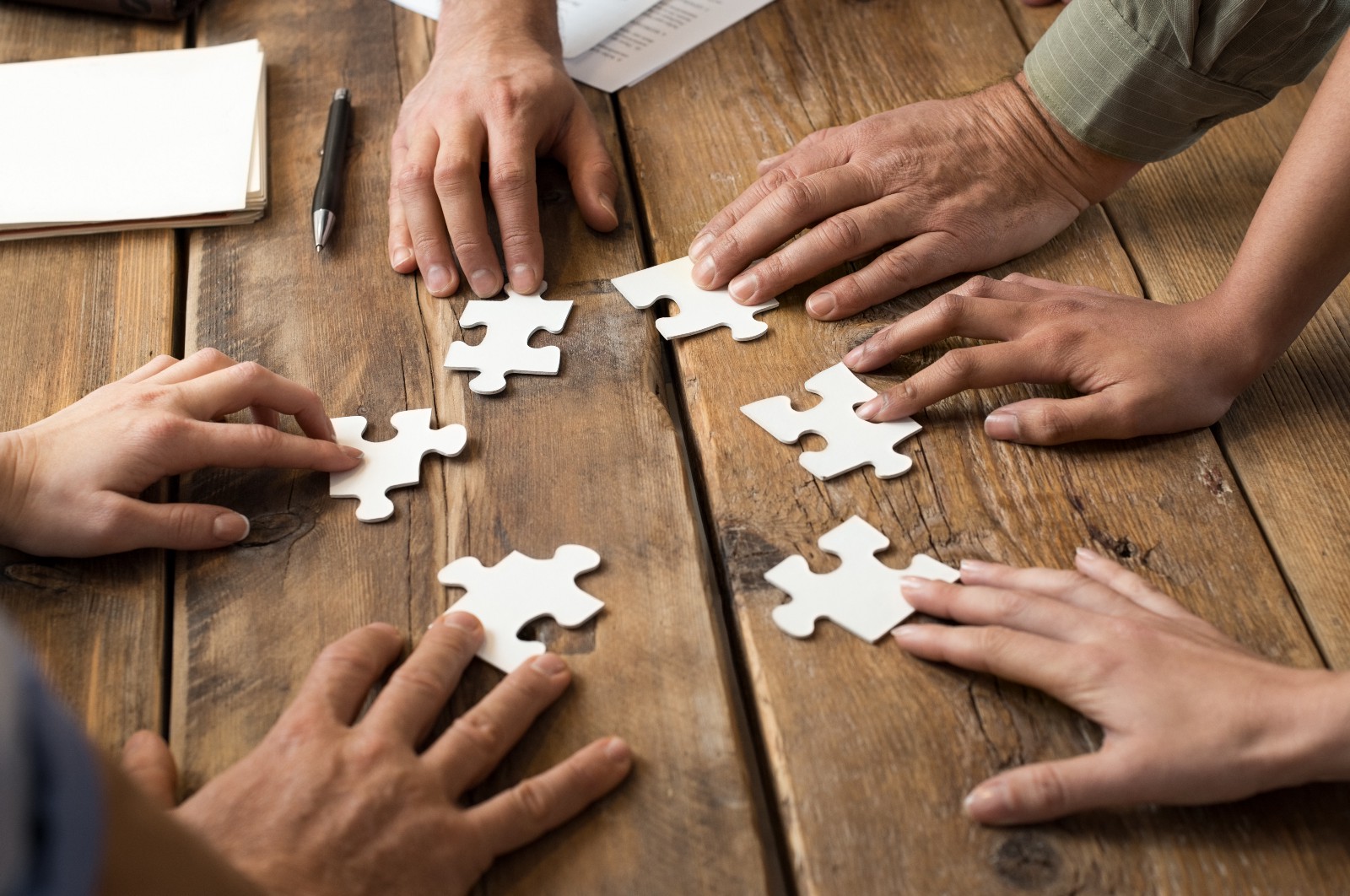 Business partners working together around a table